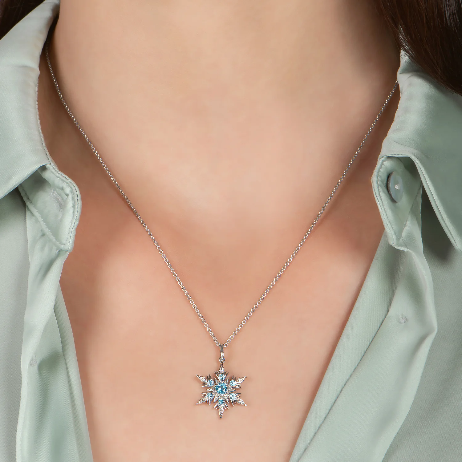 Enchanted Disney Fine Jewelry Sterling Silver with 1/10 CTTW Diamond and Swiss Blue Topaz Elsa Pendant Necklace - Image 2